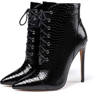 Black python pattern ankle boots. Made with microfiber. 4’7” heel. Size 11.5
